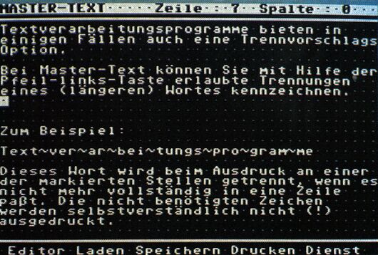 C-64-Bildschirmfoto von Master-Text mit einem Beispieltext und markierten Trennstellen