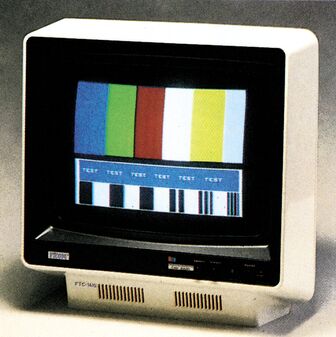 Farbmonitor Picom 4B/PR im Dreiviertelprofil mit Lüftungsschlitzen an der Gehäusefront, auf dem Bildschirm ein Testbild mit Farbbalken