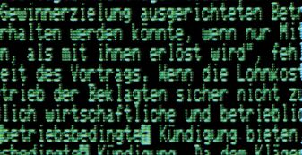 Bildschirmausschnitt des Taxan KX1201E: grüne 80-Zeichen-Textdarstellung eines deutschen Fließtextes auf schwarzem Grund
